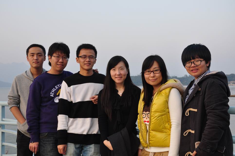 Professor Lin Dai with an earlier generation of her research group outdoors in Hong Kong